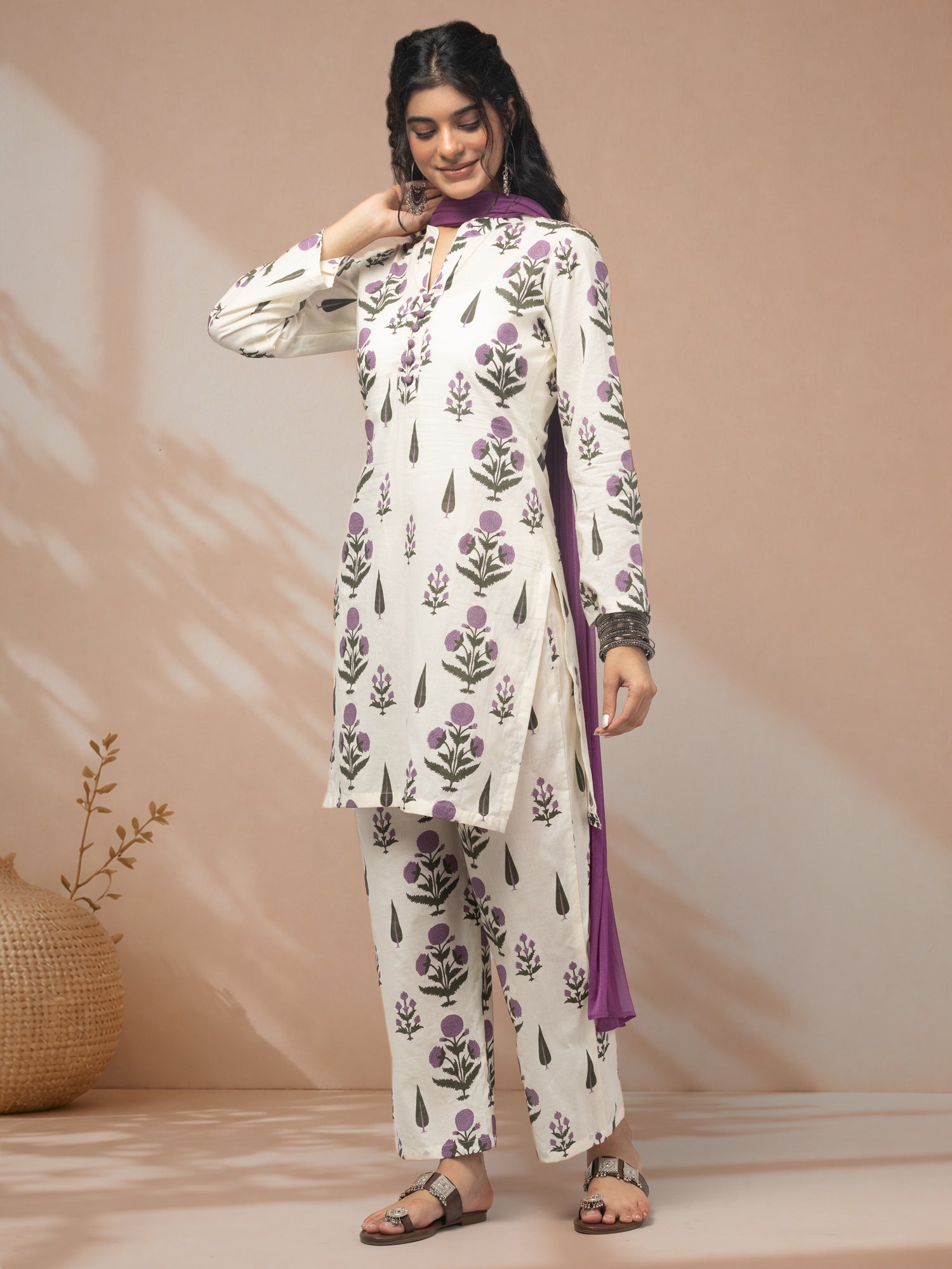 Shop designer kurta sets for women in lavender shade
