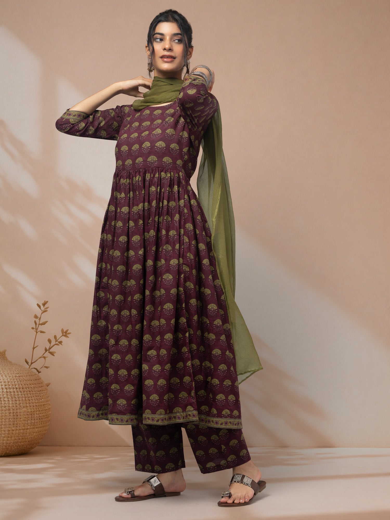 Purchase designer purple kurti set for women 
